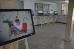 برپایی نمایشگاه عکس مرزبانی به مناسبت هفته دفاع مقدس در دانشکده منتظری 9